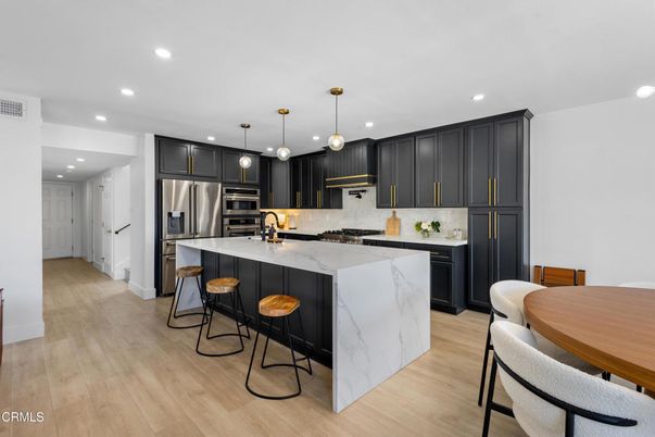 Interior, Kitchen, Pendant Lights, Recessed Lighting, Stainless Steel Appliances, Wood Texture Flooring