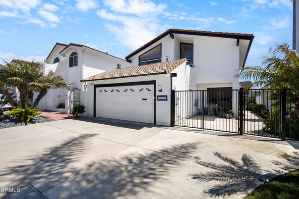 Attached, Exterior, Facade, Spanish Mediterranean
