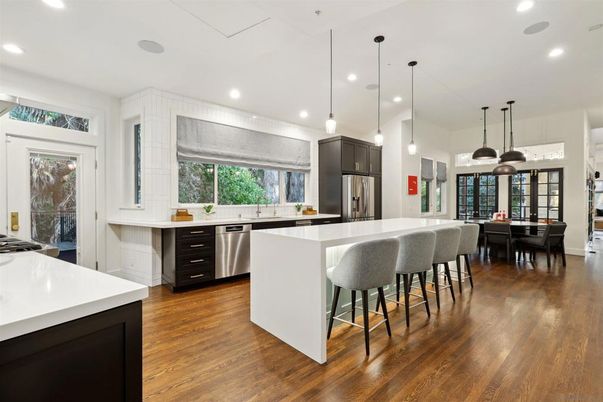Dining room, Interior, Kitchen, Pendant Lights, Recessed Lighting, Stainless Steel Appliances, Wood Texture Flooring