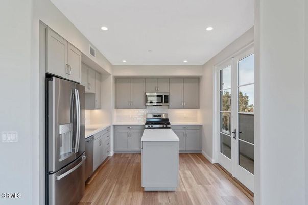 Interior, Kitchen, Recessed Lighting, Stainless Steel Appliances, Wood Texture Flooring