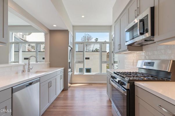 Interior, Kitchen, Recessed Lighting, Stainless Steel Appliances, Wood Texture Flooring