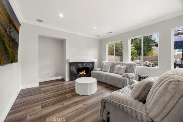 Fireplace, Interior, Living room, Recessed Lighting, Wood Texture Flooring