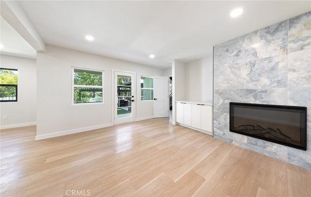 Empty room, Fireplace, Interior, Recessed Lighting, Wood Texture Flooring