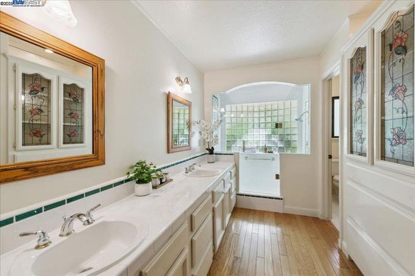 Bathroom, Dual Sink Vanities, Interior, Tile Countertops, Wood Texture Flooring
