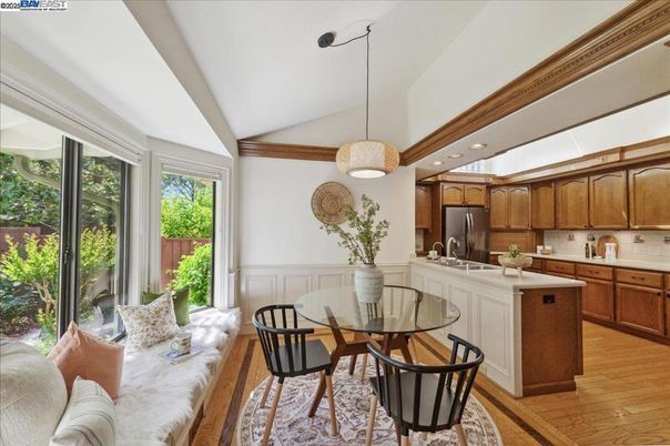 Dining room, Interior, Kitchen, Pendant Lights, Recessed Lighting, Stainless Steel Appliances, Wood Texture Flooring