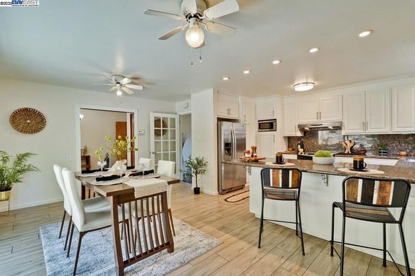 Dining room, Interior, Kitchen, Recessed Lighting, Stainless Steel Appliances, Wood Texture Flooring