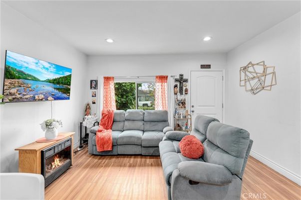 Fireplace, Interior, Living room, Recessed Lighting, Wood Texture Flooring