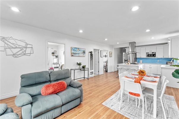 Dining room, Interior, Kitchen, Living room, Recessed Lighting, Stainless Steel Appliances, Wood Texture Flooring