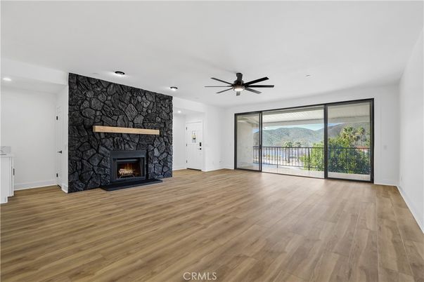 Empty room, Fireplace, Interior, Recessed Lighting, Wood Texture Flooring