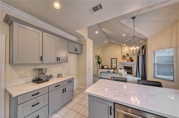 Fireplace, Interior, Kitchen, Living room, Pendant Lights, Recessed Lighting, Stainless Steel Appliances