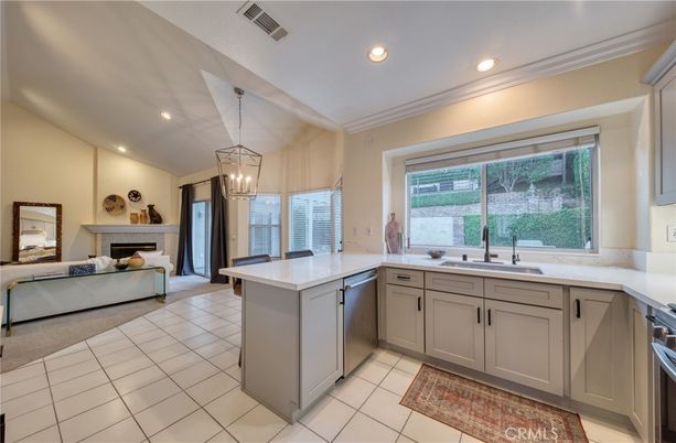 Fireplace, Interior, Kitchen, Living room, Pendant Lights, Recessed Lighting, Stainless Steel Appliances