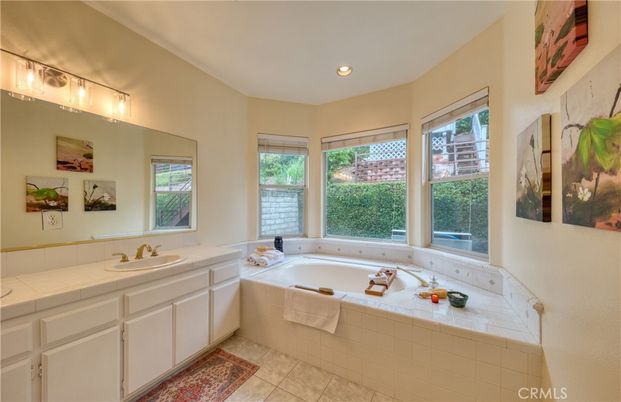 Bathroom, Dual Sink Vanities, Interior, Recessed Lighting, Tile Countertops