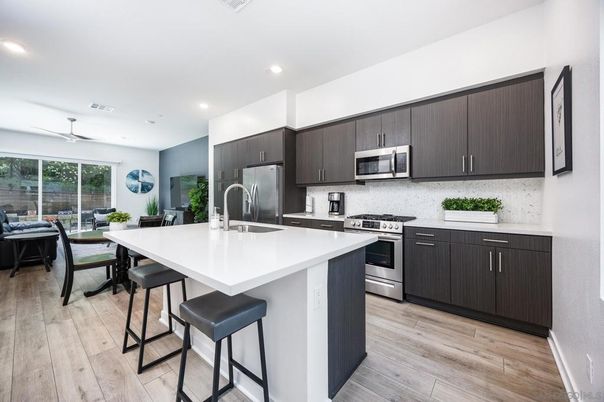 Dining room, Interior, Kitchen, Recessed Lighting, Stainless Steel Appliances, Wood Texture Flooring