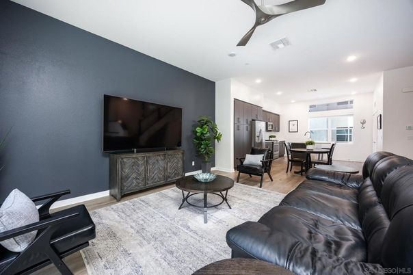 Dining room, Interior, Kitchen, Living room, Recessed Lighting, Stainless Steel Appliances, Wood Texture Flooring