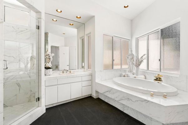 Bathroom, Dual Sink Vanities, Glass Shower, Interior, Marble Walls, Recessed Lighting