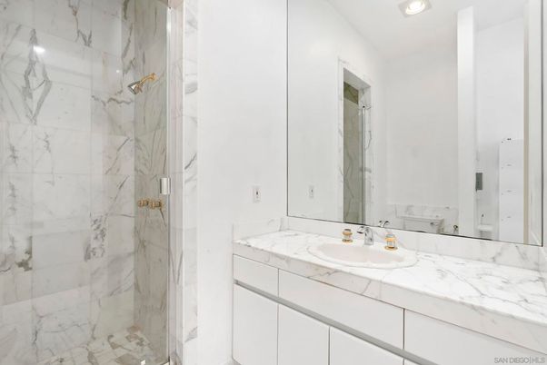 Bathroom, Dual Sink Vanities, Interior, Marble Walls, Recessed Lighting