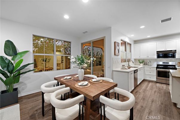 Dining room, Interior, Kitchen, Recessed Lighting, Stainless Steel Appliances, Wood Texture Flooring