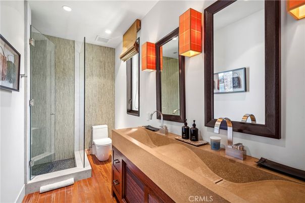 Bathroom, Dual Sink Vanities, Glass Shower, Interior, Recessed Lighting, Wood Texture Flooring