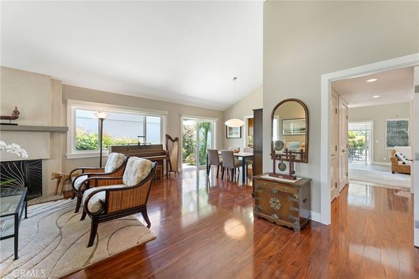 Dining room, Fireplace, Interior, Pendant Lights, Piano, Recessed Lighting, Wood Texture Flooring