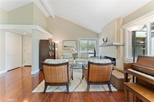 Fireplace, Interior, Living room, Piano, Recessed Lighting, Wood Texture Flooring