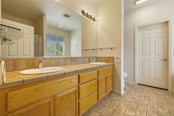 Bathroom, Dual Sink Vanities, Interior, Recessed Lighting, Tile Countertops