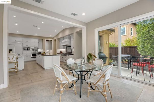 Dining room, Interior, Kitchen, Recessed Lighting, Stainless Steel Appliances, Wood Texture Flooring