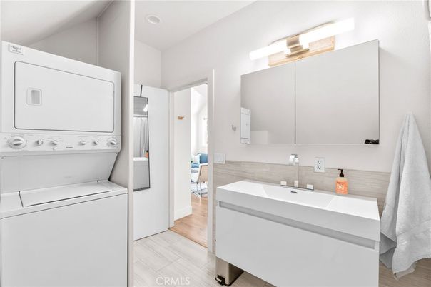 Bathroom, Interior, Recessed Lighting, Utility Closets, Washer, Wood Texture Flooring