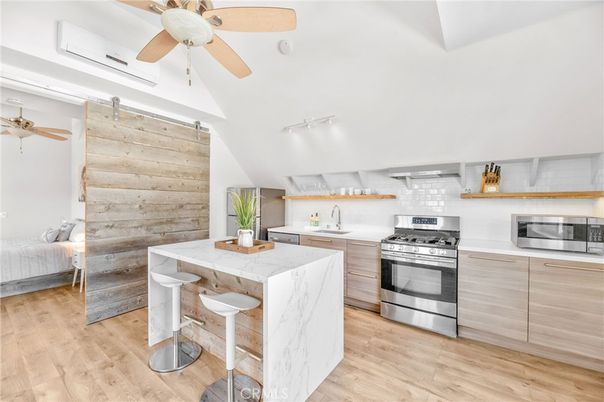 Interior, Kitchen, Stainless Steel Appliances, Wood Texture Flooring, Wooden Walls