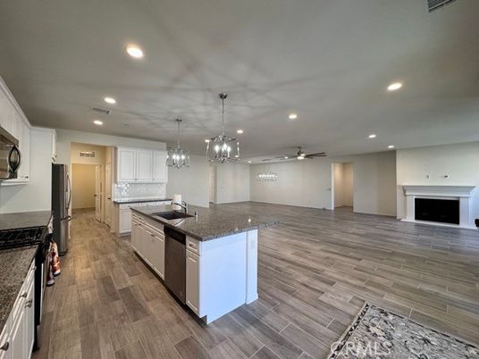 Fireplace, Interior, Kitchen, Pendant Lights, Recessed Lighting, Wood Texture Flooring