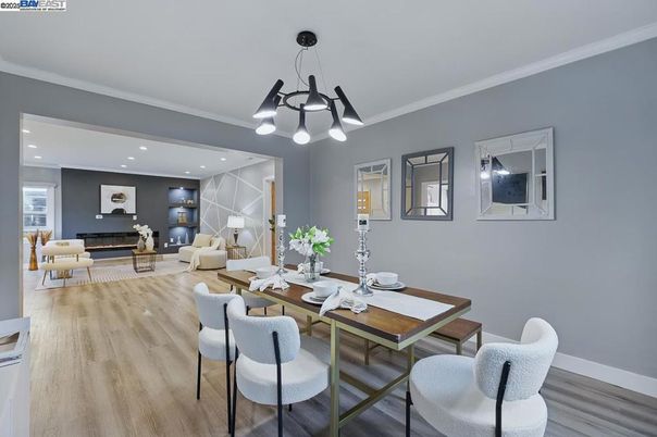 Dining room, Fireplace, Interior, Living room, Pendant Lights, Recessed Lighting, Wood Texture Flooring