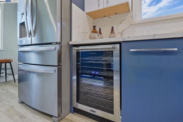 Interior, Kitchen, Marble Walls, Stainless Steel Appliances, Wood Texture Flooring