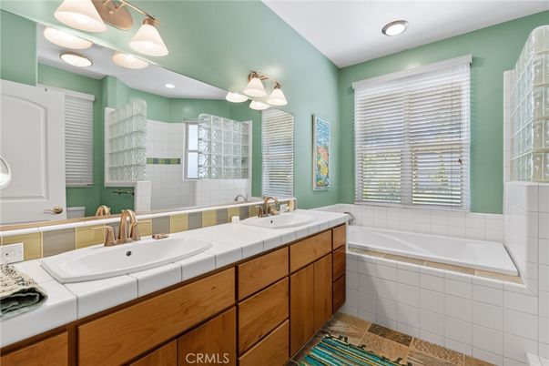 Bathroom, Dual Sink Vanities, Interior, Recessed Lighting, Tile Countertops