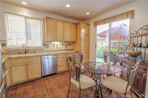 Dining room, Interior, Kitchen, Recessed Lighting, Stainless Steel Appliances, Wood Texture Flooring