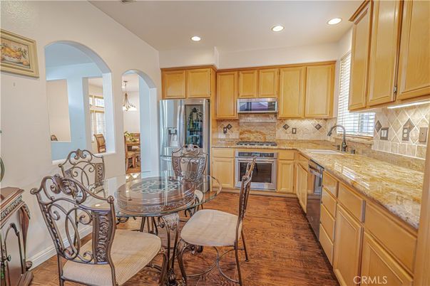 Dining room, Interior, Kitchen, Recessed Lighting, Stainless Steel Appliances, Wood Texture Flooring