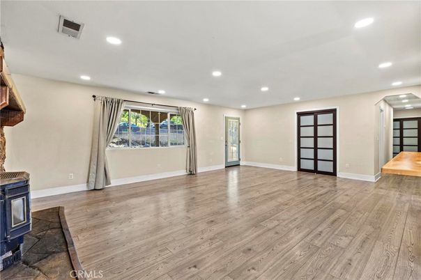 Empty room, Fireplace, Interior, Recessed Lighting, Wood Texture Flooring