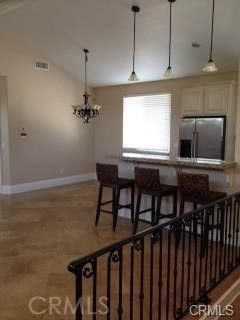 Chandelier, Dining room, Interior, Kitchen, Pendant Lights, Stainless Steel Appliances, Wood Texture Flooring