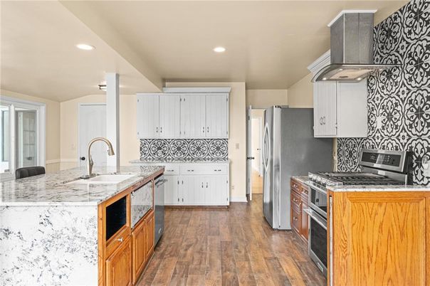 Interior, Kitchen, Recessed Lighting, Stainless Steel Appliances, Wood Texture Flooring