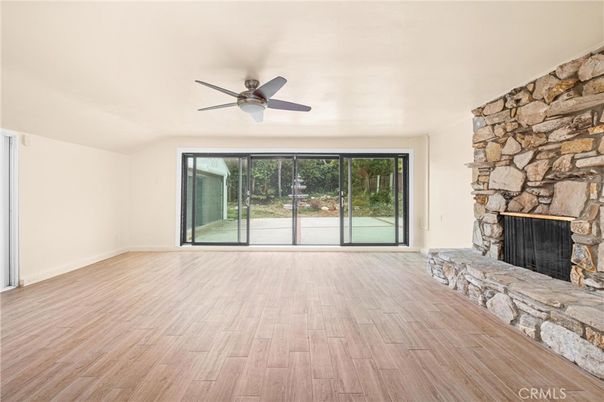 Empty room, Fireplace, Interior, Stone Walls, Wood Texture Flooring