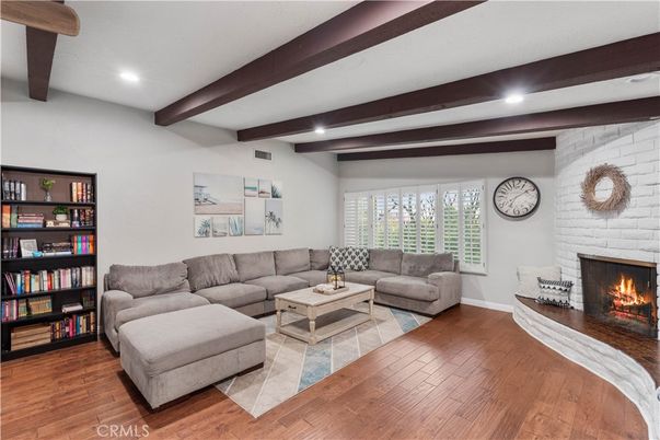 Fireplace, Interior, Living room, Recessed Lighting, Stone Walls, Wooden Beams, Wood Texture Flooring