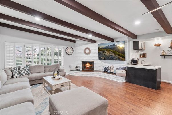 Fireplace, Interior, Living room, Recessed Lighting, Stone Walls, Wooden Beams, Wood Texture Flooring