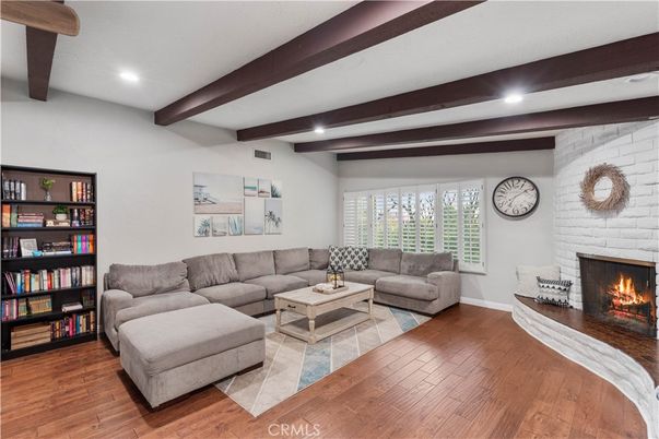 Fireplace, Interior, Living room, Recessed Lighting, Stone Walls, Wooden Beams, Wood Texture Flooring