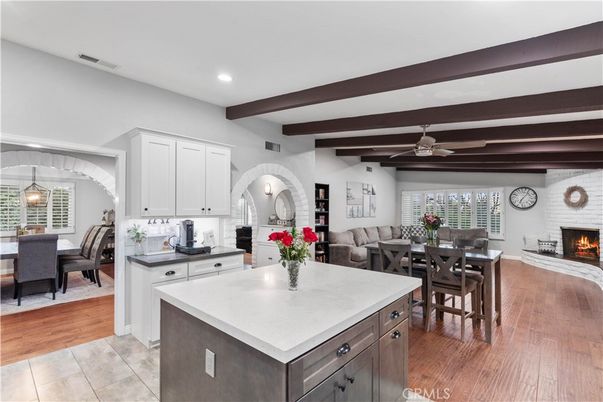 Dining room, Fireplace, Interior, Kitchen, Living room, Pendant Lights, Recessed Lighting, Stone Walls, Wooden Beams, Wood Texture Flooring