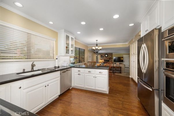 Chandelier, Interior, Kitchen, Recessed Lighting, Stainless Steel Appliances, Wood Texture Flooring