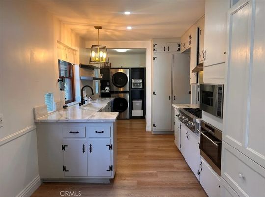 Interior, Kitchen, Pendant Lights, Recessed Lighting, Stainless Steel Appliances, Wood Texture Flooring