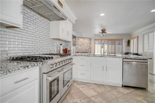 Interior, Kitchen, Recessed Lighting, Stainless Steel Appliances, Stone Walls