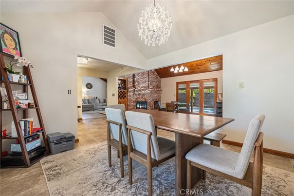 Chandelier, Dining room, Fireplace, Interior, Living room, Stone Walls