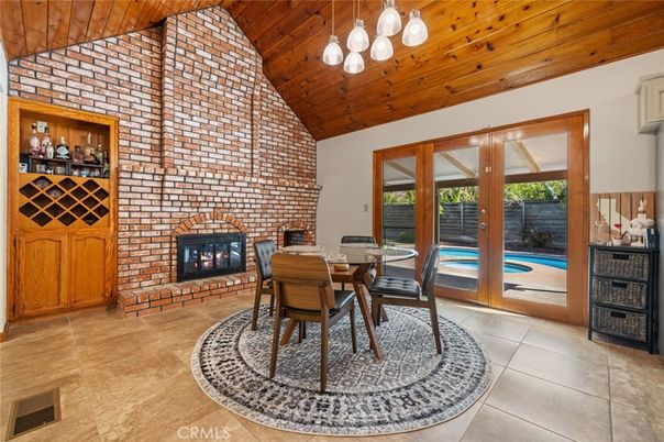 Dining room, Fireplace, Interior, Pendant Lights, Stone Walls, Wooden Ceilings