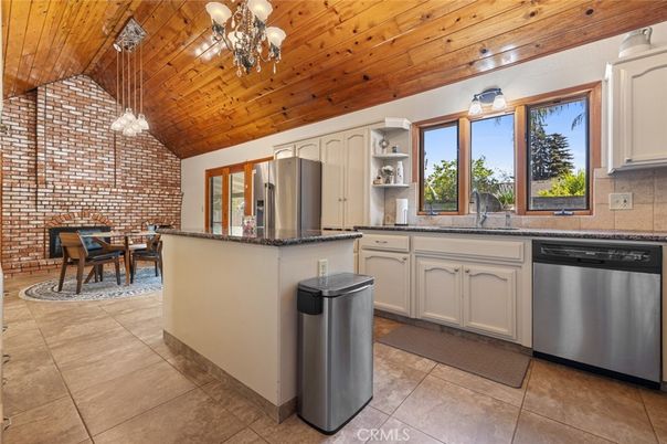 Dining room, Interior, Kitchen, Pendant Lights, Stainless Steel Appliances, Stone Walls, Wooden Ceilings