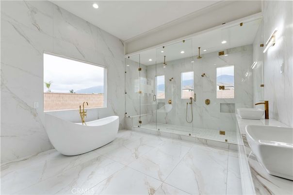 Bathroom, Free Standing Baths, Glass Shower, Interior, Marble, Marble Walls, Recessed Lighting