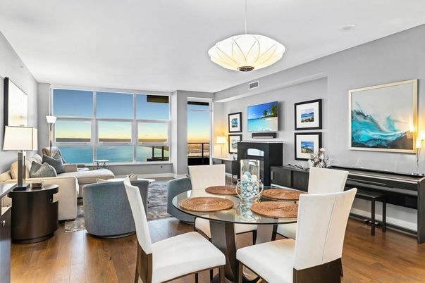 Dining room, Fireplace, Interior, Living room, Pendant Lights, Piano, Water, Wood Texture Flooring